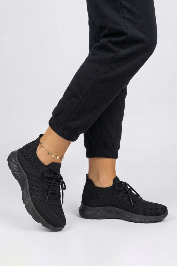 Versatile women's lace-up knit sneakers designed for all-day comfort, ideal for walking & casual style.