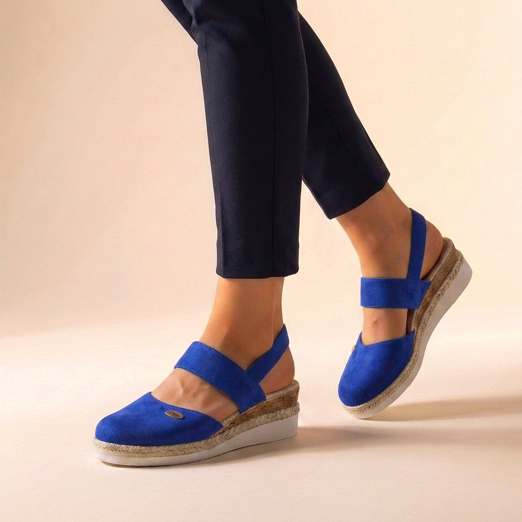 Women's comfortable platform espadrille sandals with a trendy wedge heel, perfect for summer & beach style.
