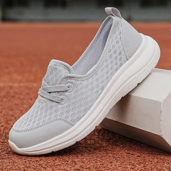 Cushioned women's walking shoes with arch support & slip-resistant sole.