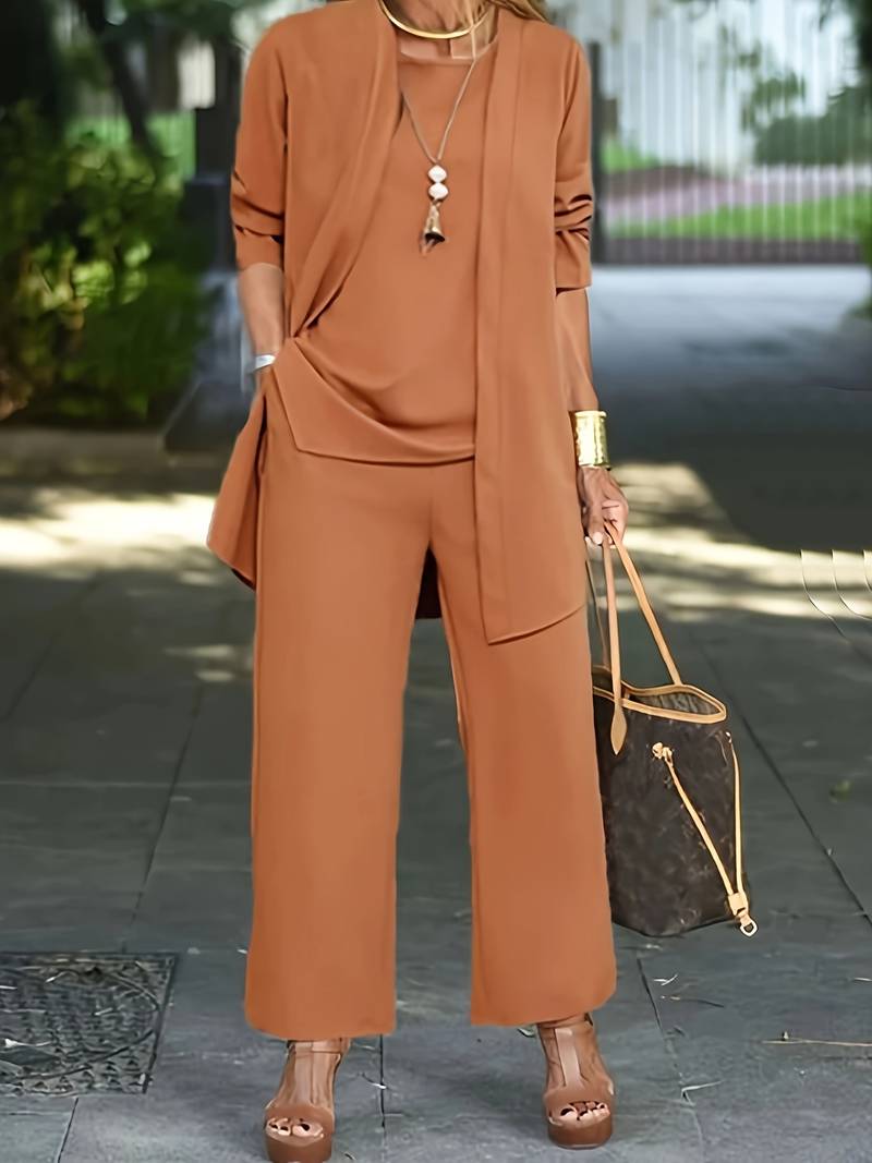 Chic women's coordinated 3 piece set, featuring a long sleeve top, round neck, and relaxed wide leg lounge pants.
