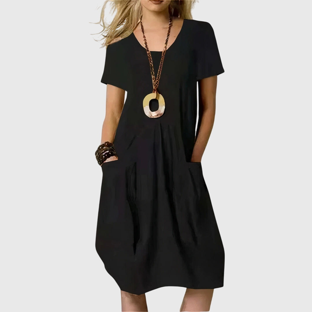 Flattering A-line women's casual dress with pockets, ideal for summer, comfortable & versatile everyday wear.