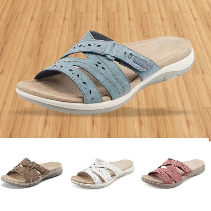 Durable women's adjustable walking sandals. Hook-and-loop closure provides secure fit for summer outdoor activities.