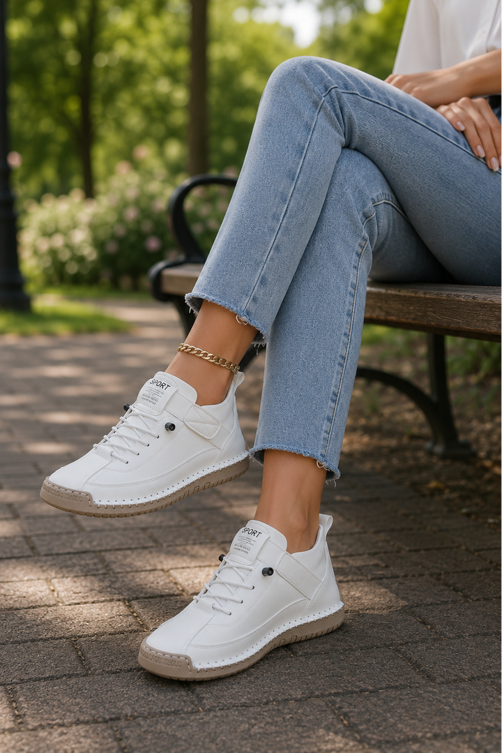 Dynamic shot of lightweight women's casual sneakers, emphasizing comfort & modern style.