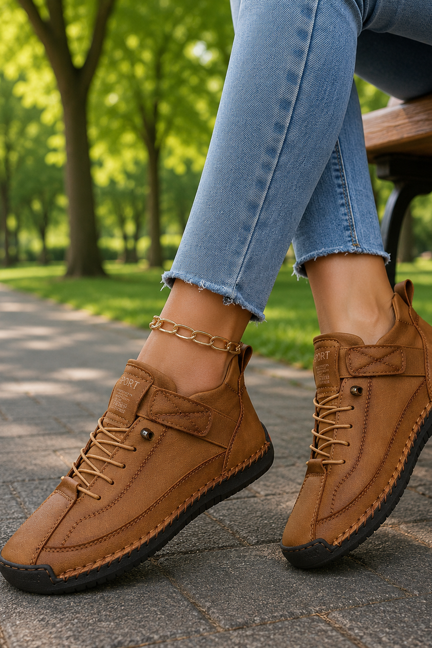 Women's comfortable walking shoes worn on feet, showing stylish athleisure look.