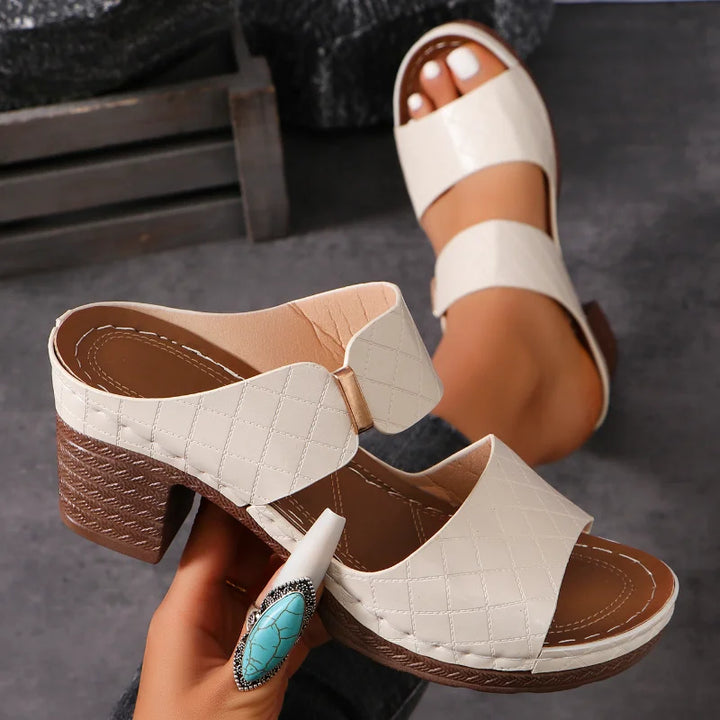 Versatile women's slip-on leather sandals with a stable block heel for all-day comfort & chic look.