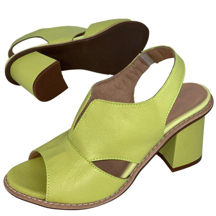 Side view of women's comfortable block heel sandals, showing elegant design & secure buckle.