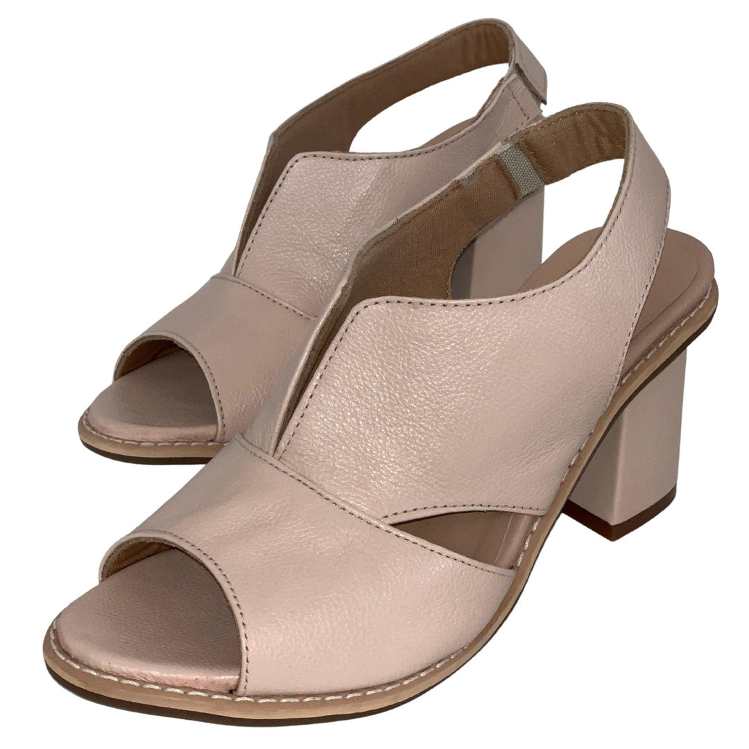 Elegant women's block heel sandals, versatile for work to evening, with secure buckle closure.