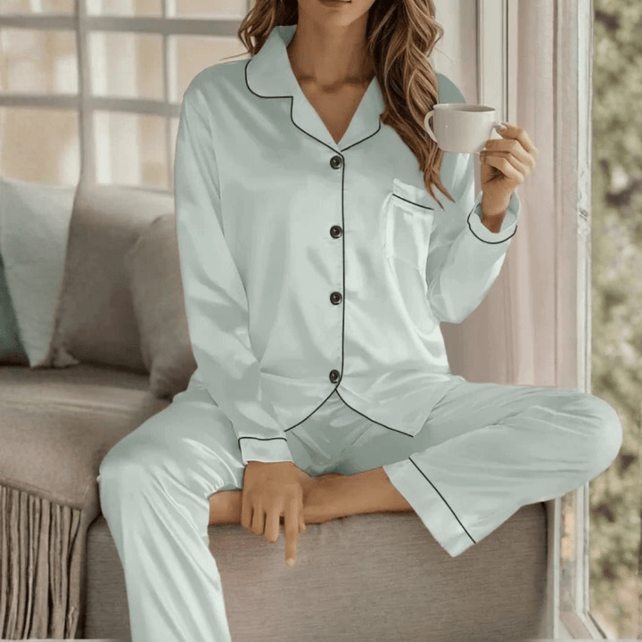 Lightweight women's breathable pajama set with a functional button front, perfect for restful sleep.