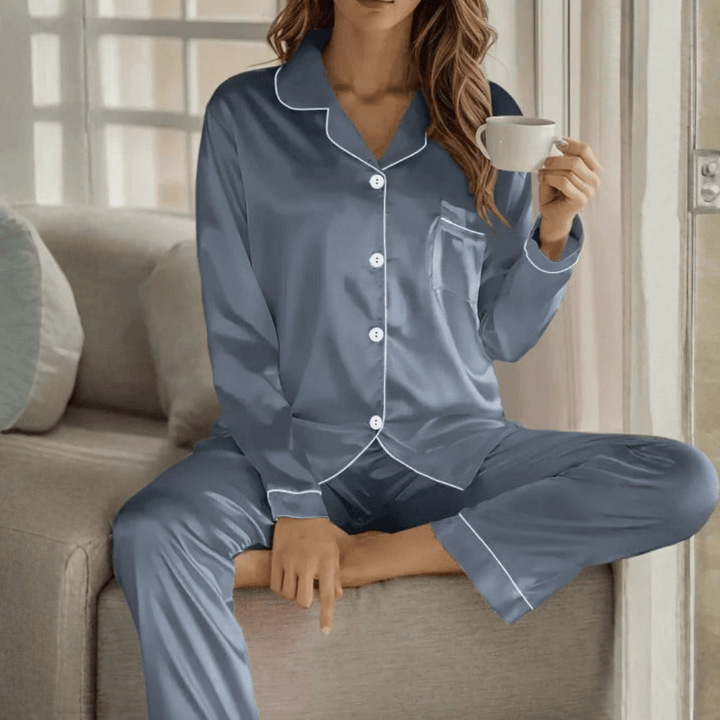 Chic women's loungewear pajama set, breathable fabric, button front, for home comfort.
