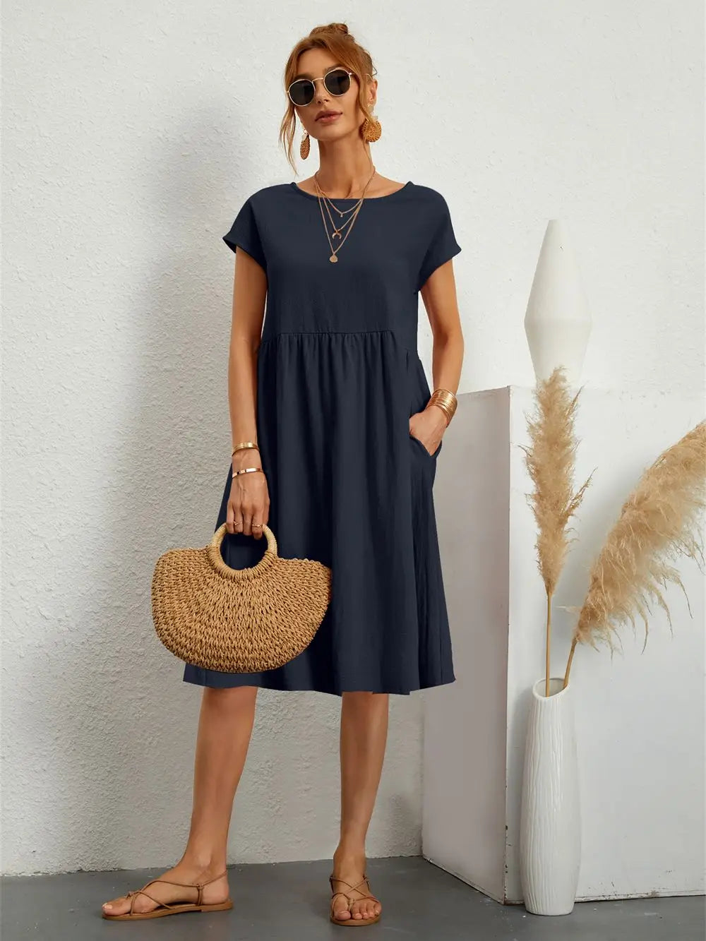 Relaxed fit women's casual midi dress, offering chic style and ultimate comfort for daily wear.
