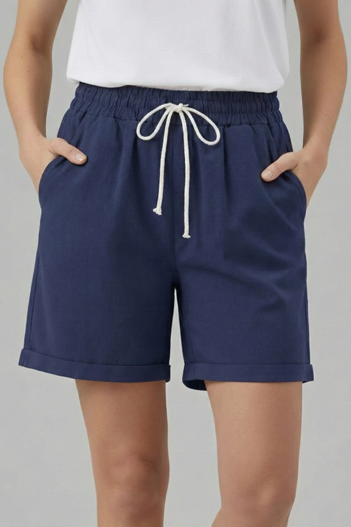 Stylish women's casual shorts with elastic waist, drawstring, and convenient side pockets for everyday use.