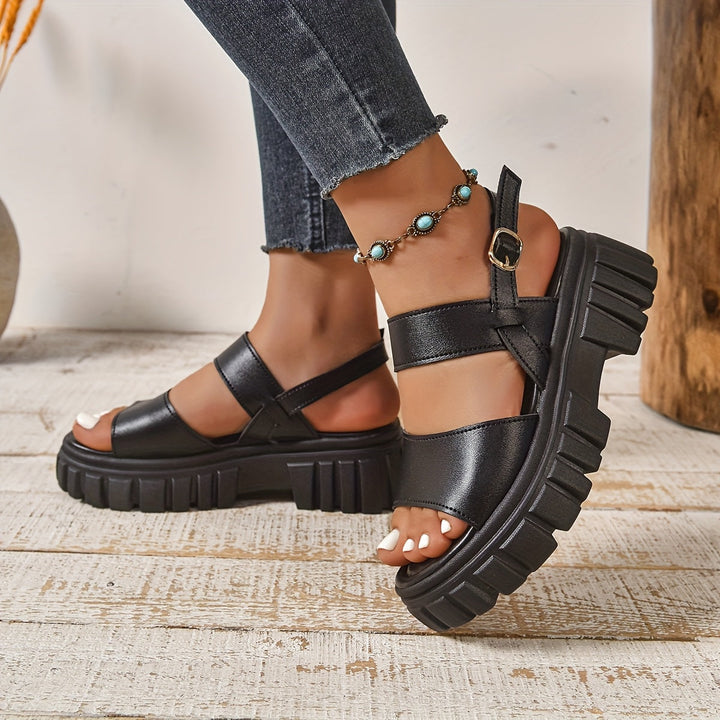 Open-toe slip-on flat sandals for women. Comfortable casual summer shoes, great for everyday wear.