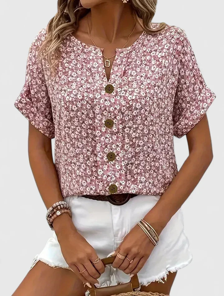Women's comfortable floral button-up blouse, relaxed fit, perfect for everyday wear. Casual elegant top.