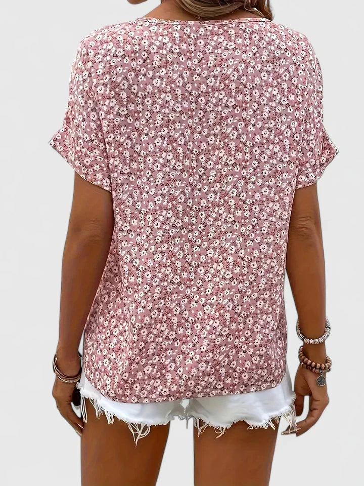 Relaxed fit women's floral button-up shirt, comfortable and stylish for spring/summer everyday wear.