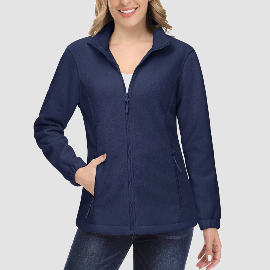 Woman running errands in a comfortable white full-zip fleece jacket, practical fall fashion