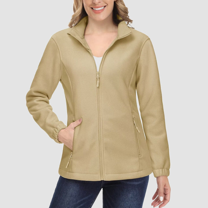 Detail shot of the interior of a women's full-zip fleece jacket, showing its soft fleece lining