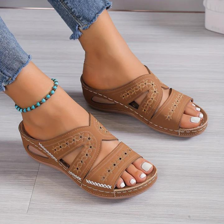 Open toe orthopedic sandals for women, slip-on style, offering arch support & comfort.