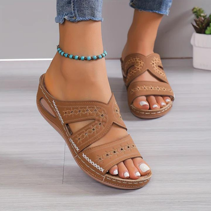 Stylish women's slip-on open toe sandals, cushioned for ultimate orthopedic comfort.