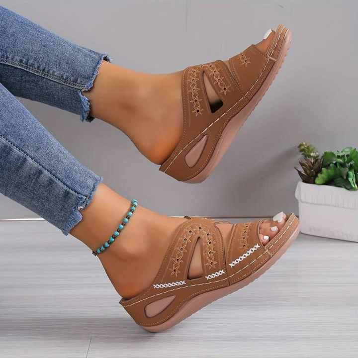 Comfortable women's open toe sandals with orthopedic features and excellent arch support.