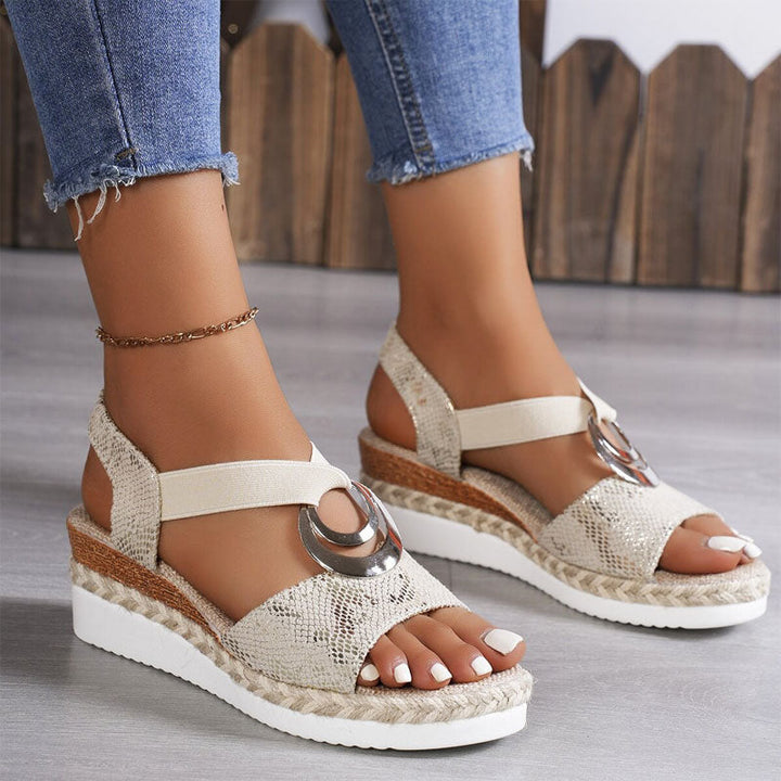 Stylish women's open toe wedge sandals featuring elastic strappy design and platform sole for casual summer fashion.
