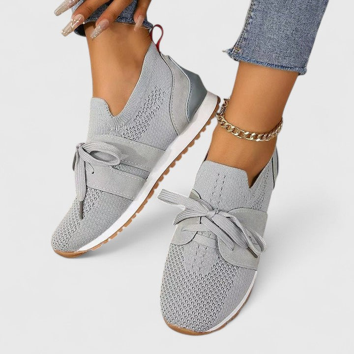 Breathable, non-slip women's orthopedic slip-on sneakers offering comfort and essential foot support.