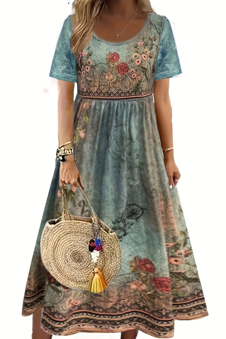 Women's comfortable printed midi dress, relaxed fit. Elegant everyday style, perfect for casual spring & summer wear.