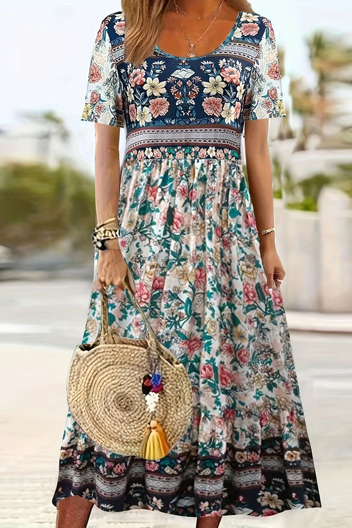 Versatile women's printed midi dress for elegant everyday style. Comfortable relaxed fit, great for spring/summer casual.