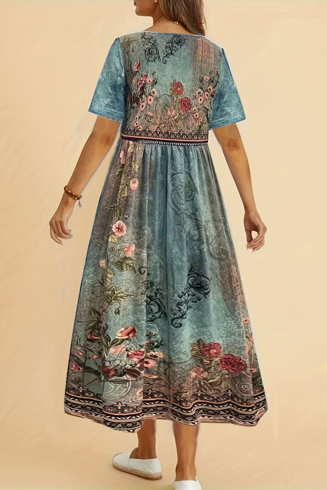 Stylish women's printed midi dress, comfortable relaxed fit. Elegant everyday wear, versatile for spring/summer casual.