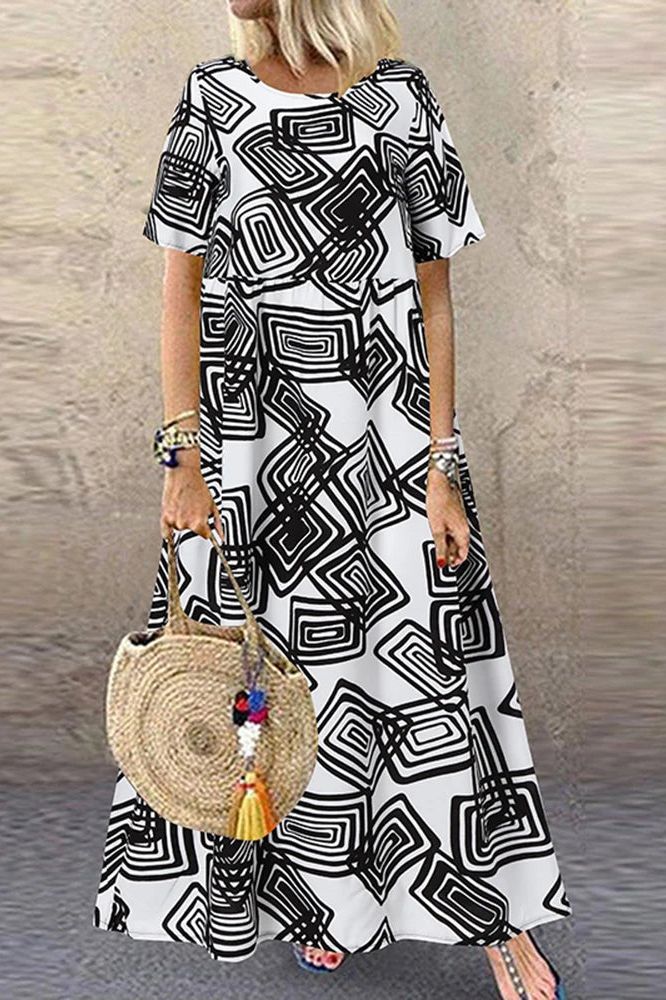 Effortlessly stylish women's maxi dress, featuring a comfortable relaxed fit and elegant flowy design.