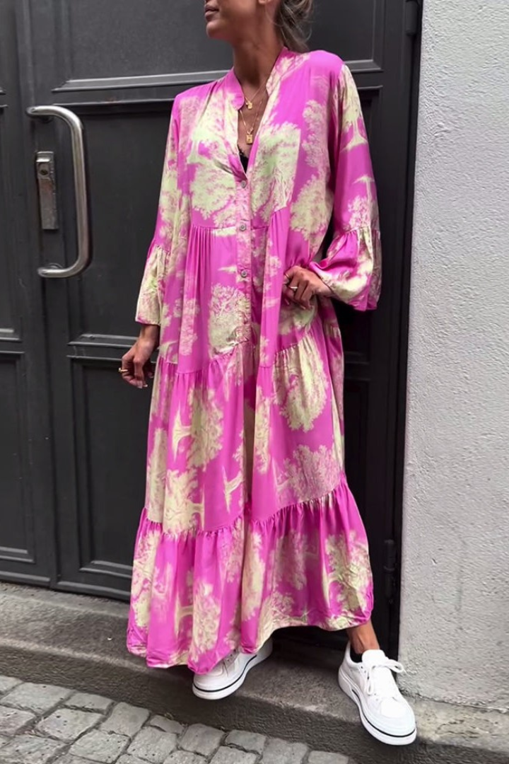 Elegant long flowing maxi dress for women, versatile for spring and summer casual or dressed up looks.