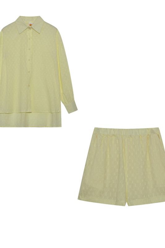 Stylish women's relaxed fit shirt and short set, perfect for a cozy summer day in or out.