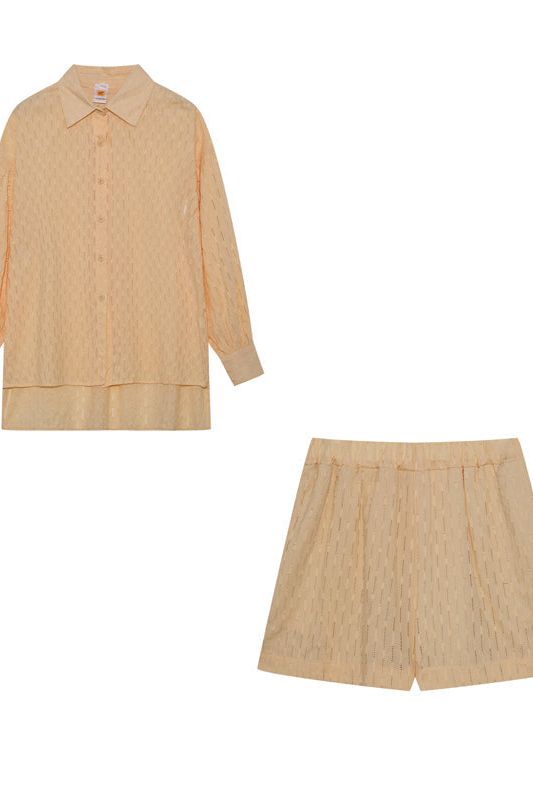 Women's summer loungewear set: soft shirt and comfy shorts. Essential for warm weather.
