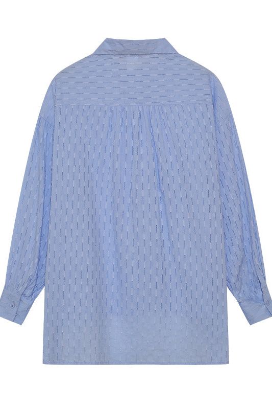 Modern women's casual shirt and short set, a fashionable & comfortable summer ensemble.