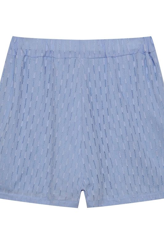 Women's comfortable summer shirt and short set. Versatile two-piece for everyday relaxation.