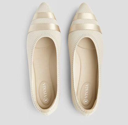 Top-down view of versatile women's slip-on flats, ideal comfortable ballerinas for spring & summer.