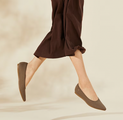 Woman wearing comfortable slip-on ballerinas, showcasing spring & summer everyday elegance.