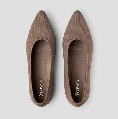 Close-up of breathable fabric on women's comfortable slip-on ballerinas for spring/summer wear.