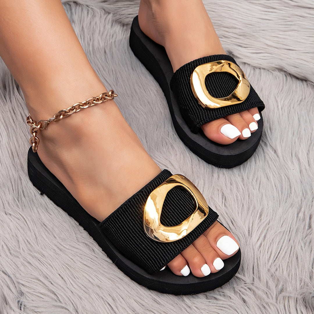 Women's comfortable slip-on flat sandals for everyday wear, perfect casual summer footwear.