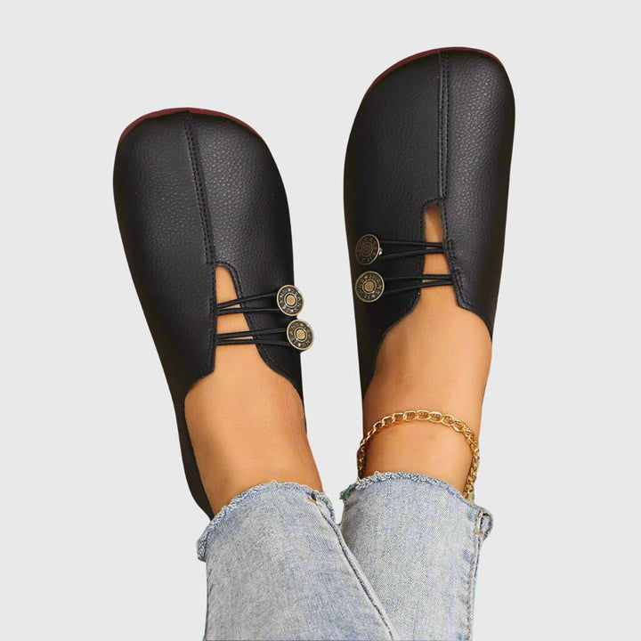 Comfortable women's slip-on flat shoes with toggle lace, designed for a barefoot feel and flexible everyday wear.