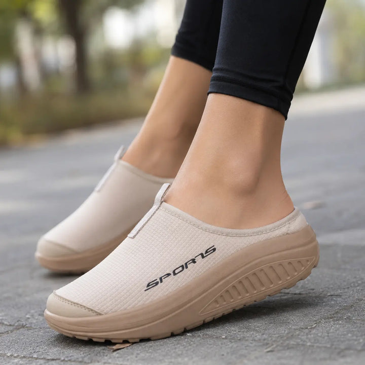 Ergonomic women's slip-on slippers, offering orthopedic comfort and stability as house shoes.