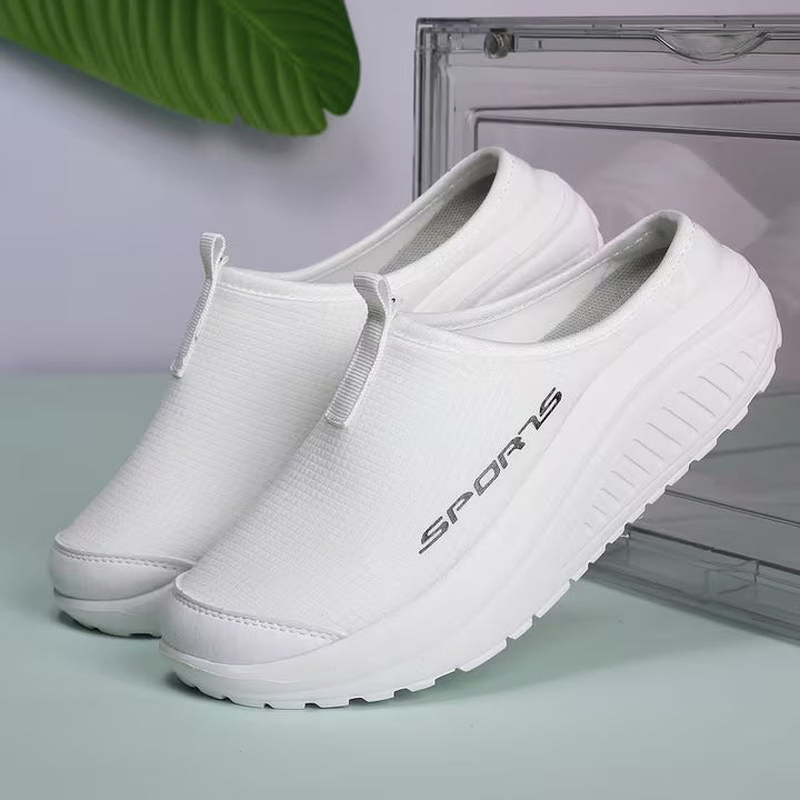 Practical women's orthopedic indoor footwear, easy slip-on style for cozy, supportive comfort.