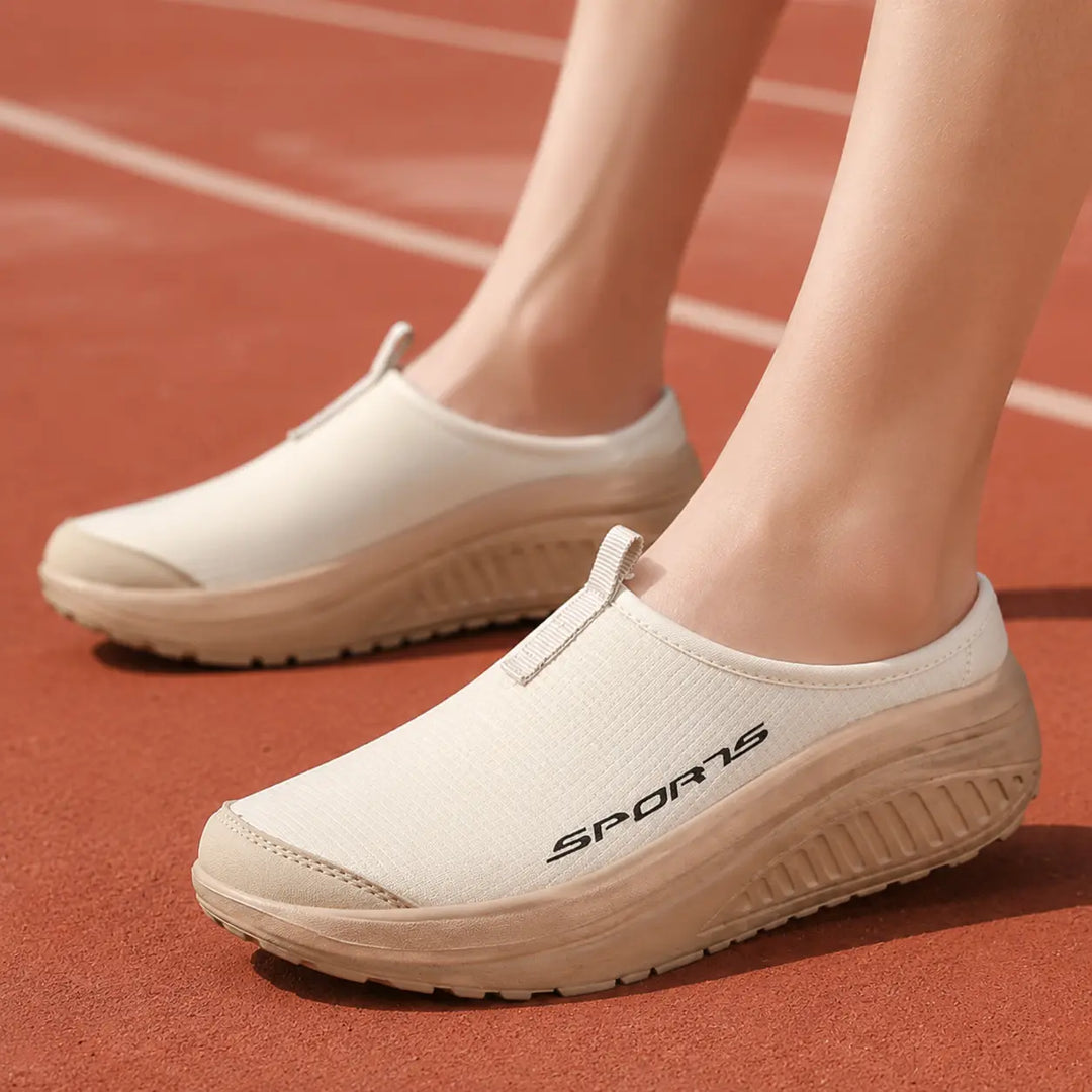 Supportive women's orthopedic indoor slippers, providing all-day comfort and foot support.