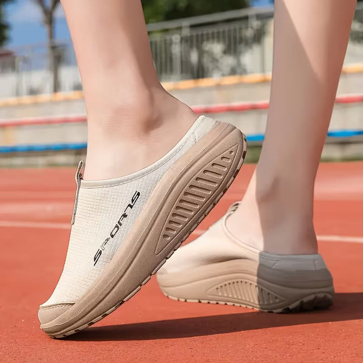 Plush women's orthopedic slippers, perfect for cozy indoor wear with targeted foot support.