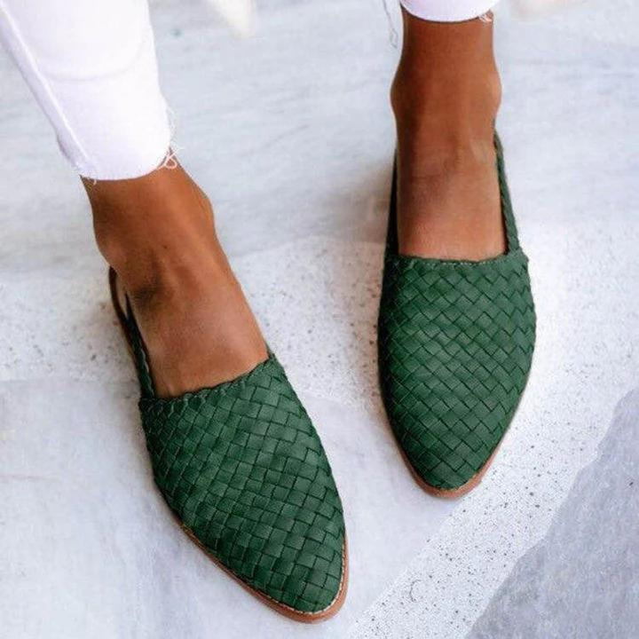Chic women's backless woven mules; comfortable pointed toe slip-ons ideal for versatile casual or office looks.