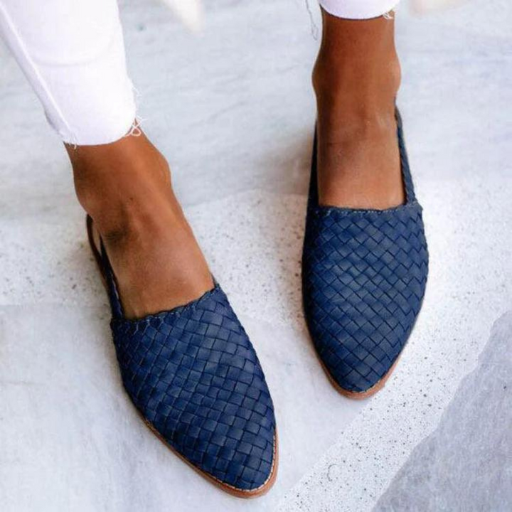 Fashionable women's pointed toe slip-on mules, featuring a unique woven design for comfort & style.