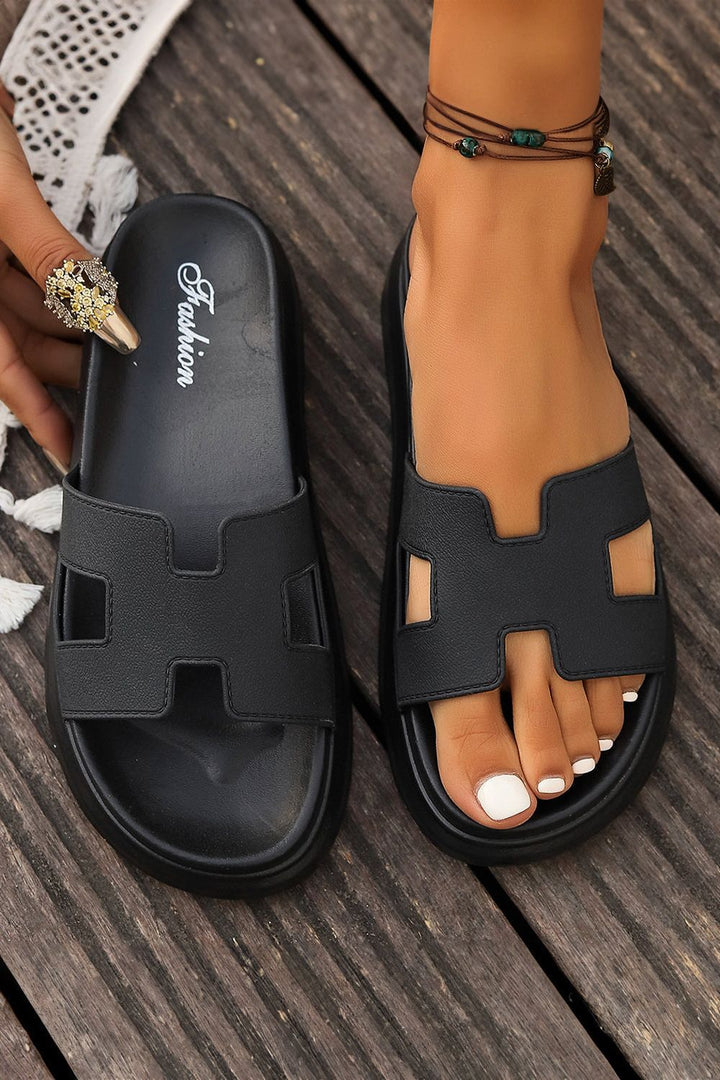 Casual women's slip-on sandals with cushioned open-toe design for summer.