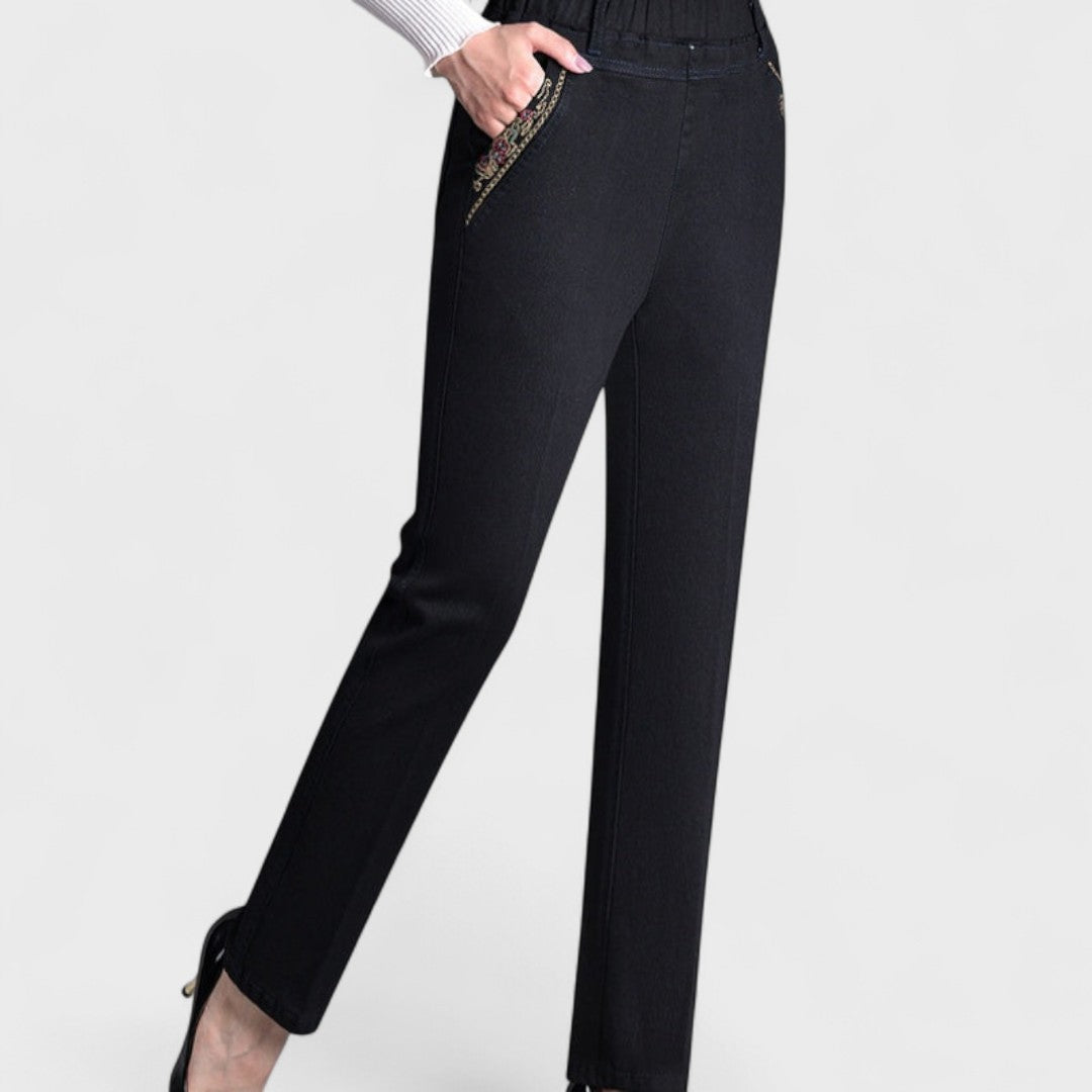 Soft dark blue women's stretch denim jeans. Comfortable elastic waist for everyday casual wear.