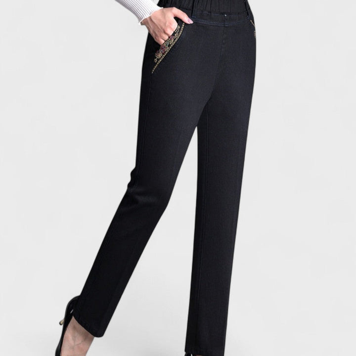Soft dark blue women's stretch denim jeans. Comfortable elastic waist for everyday casual wear.