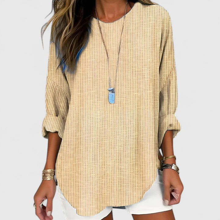 Women's comfortable striped blouse with a relaxed fit, perfect for casual chic and everyday wear. Versatile crew neck top.