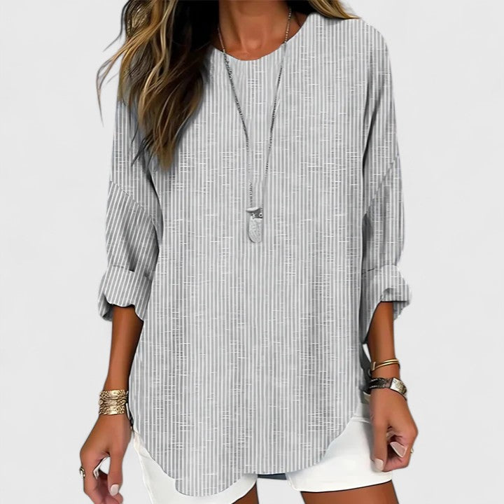Effortless women's striped crew neck blouse, a comfortable and stylish top with a relaxed fit for casual everyday apparel.